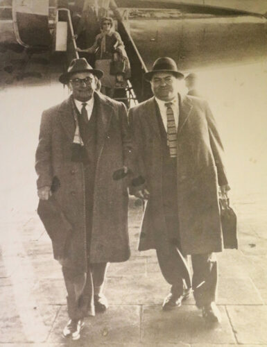 Davie (right) and Mel (left) returning from a meeting in England